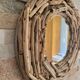 Very nice driftwood mirror.