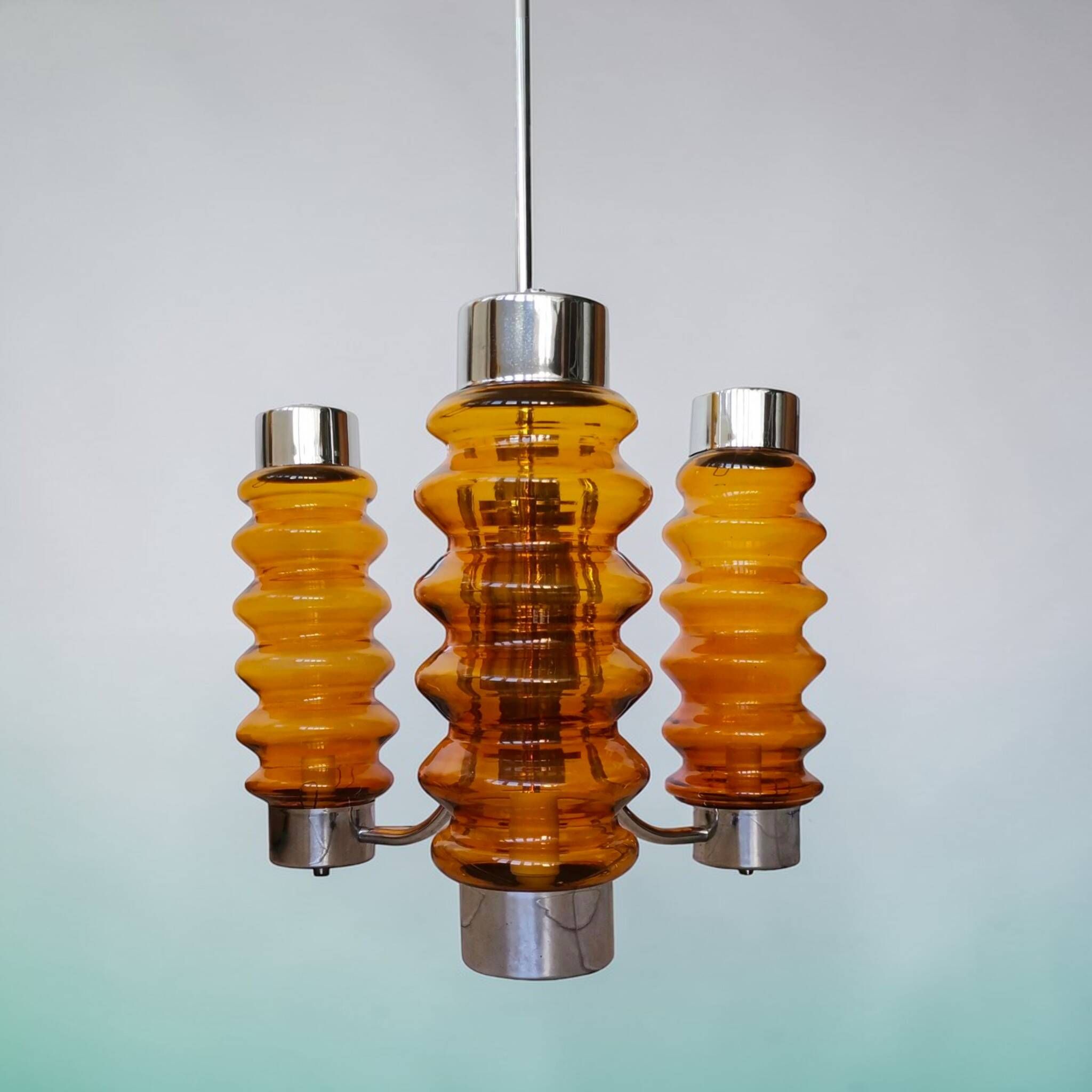 Mid Century Modern large chandelier with amber glass
