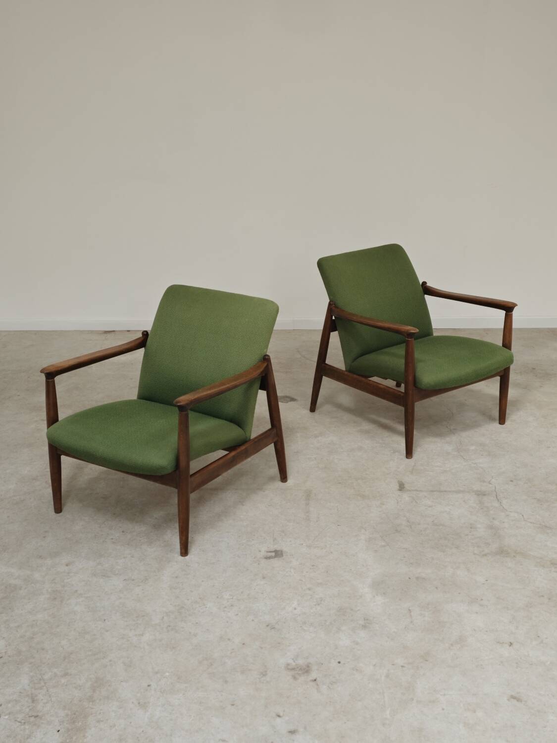 Pair of green GMF 64 armchairs by
Edmund Homa, Poland, 1960s