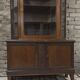 Vintage two-body display cabinet in oak from the 1950s.