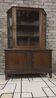 Vintage two-body display cabinet in oak from the 1950s.