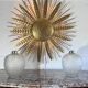 Large golden hammered metal sun wall light with a diameter of 90 cm from the year
