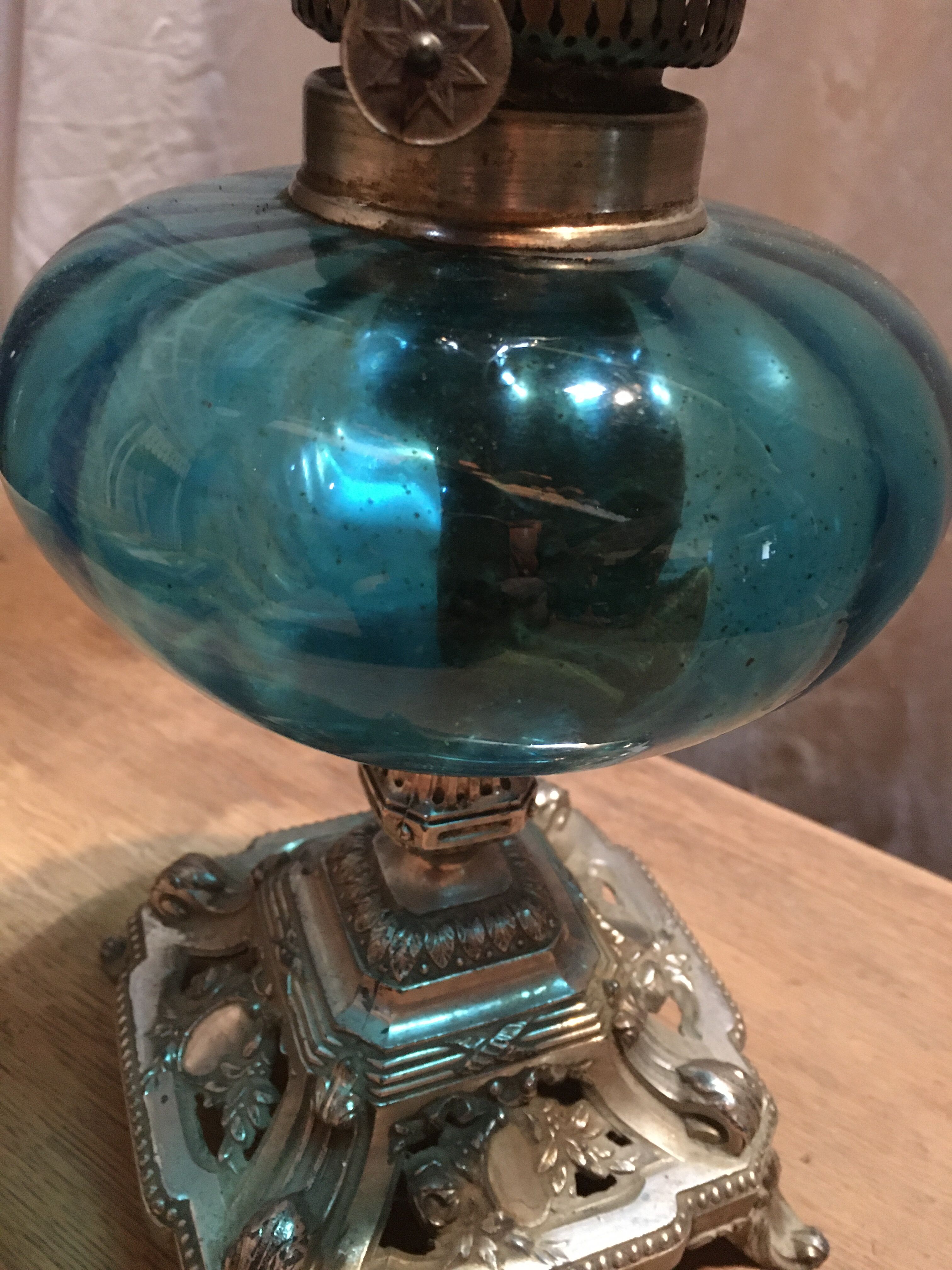 Blue oil lamp and metal foot