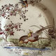 Polychrome ironstone dessert plates from Digoin and Sarreguemines.