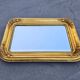 Large Biedermeier gilded mirror in faceted wood, circa 1840.