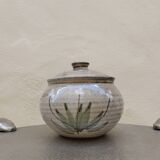 Covered enameled earthenware pot