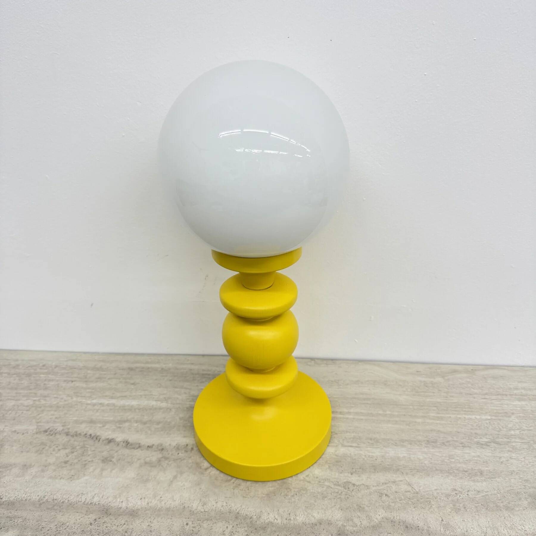 Mid-century design yellow table lamp with glass globe, 1970s