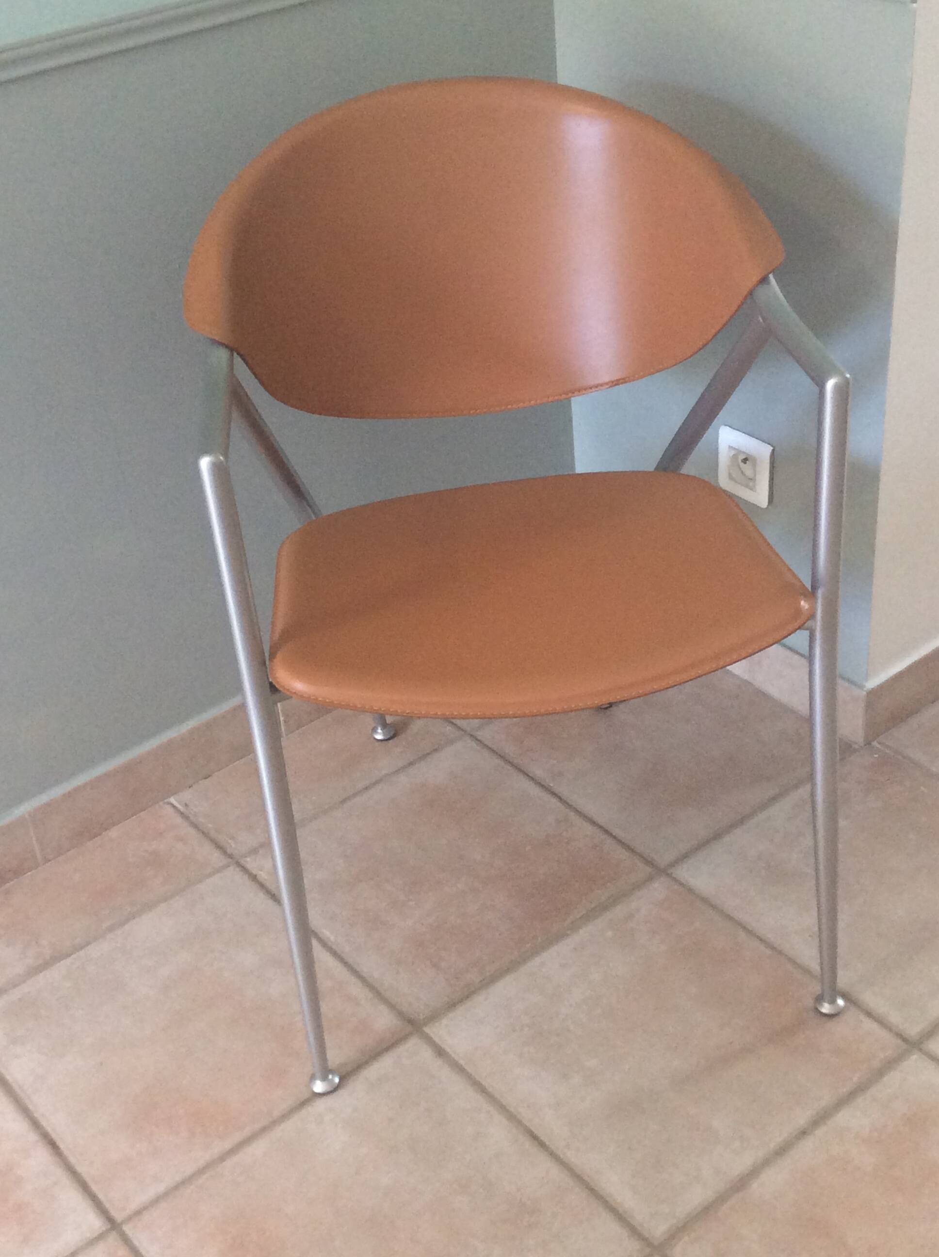 Leather and metal armchairs