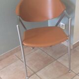 Leather and metal armchairs