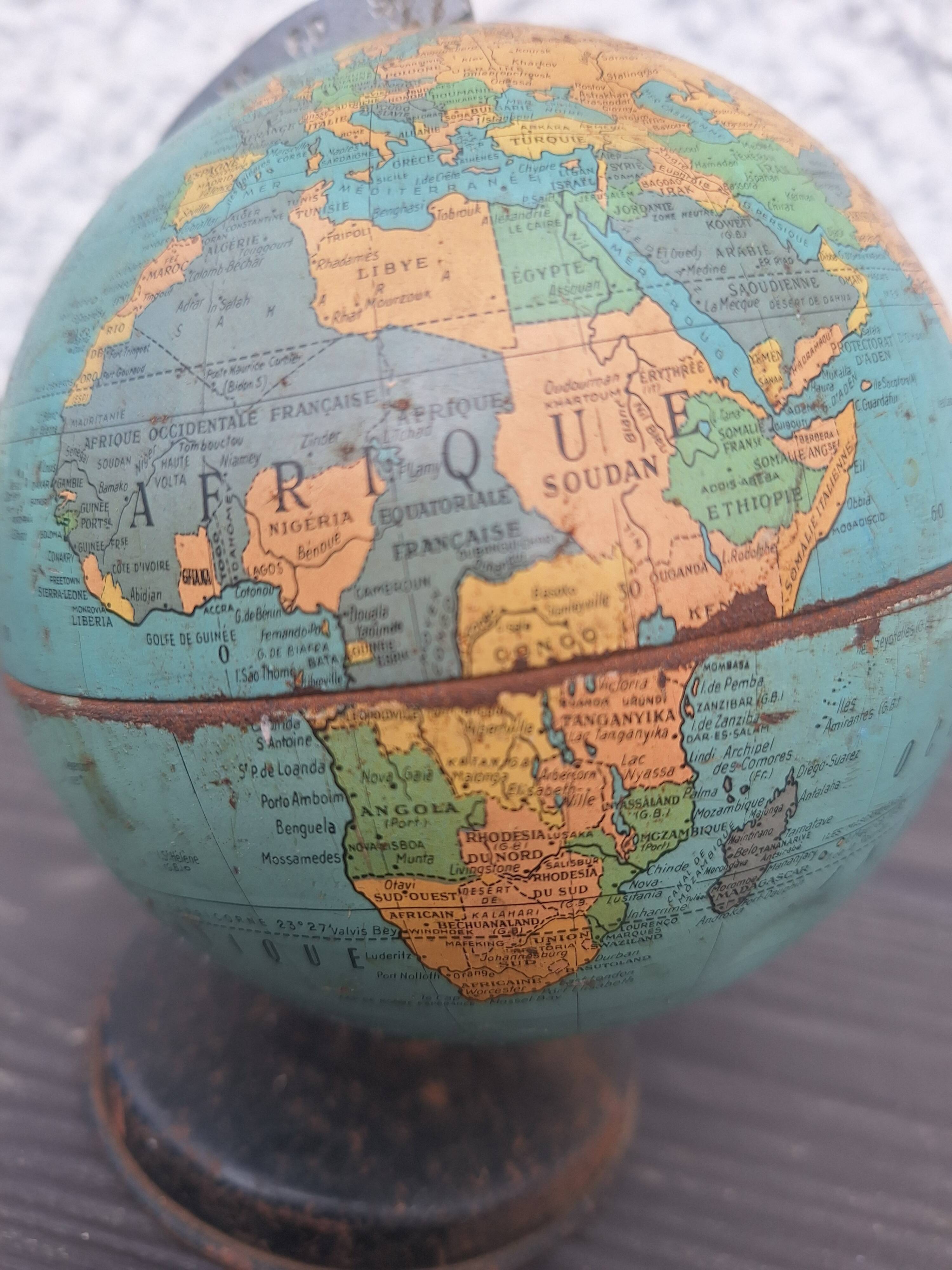 Old small metal globe "taride maps"