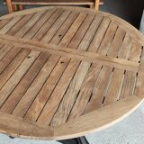 Industrial table with cast iron legs and teak top