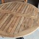 Industrial table with cast iron legs and teak top