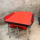 4 red Formica chairs with a 1970s table