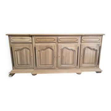 Very well, 4 doors 4 drawers in oak.