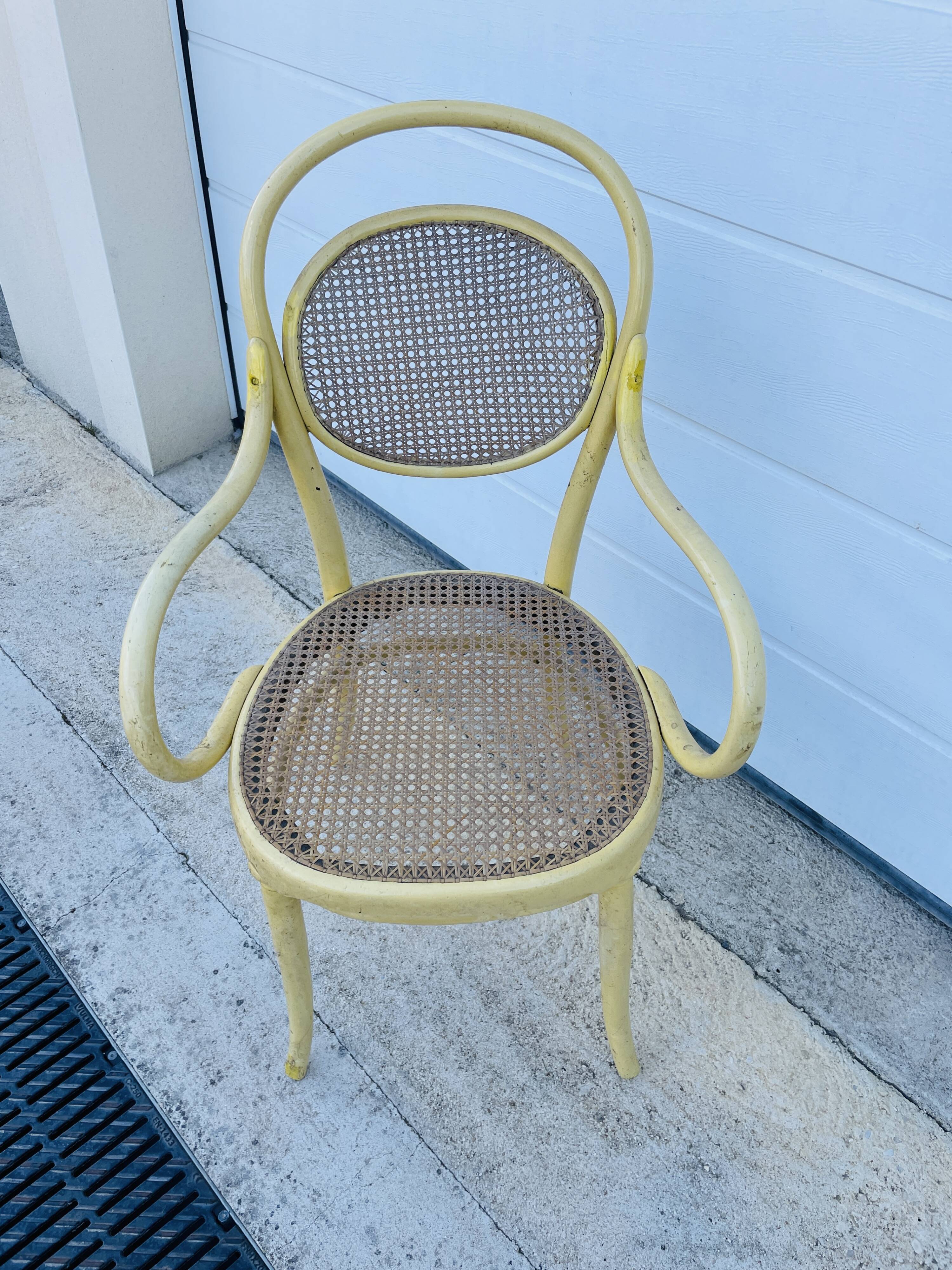 Old armchair Thonet canned wood