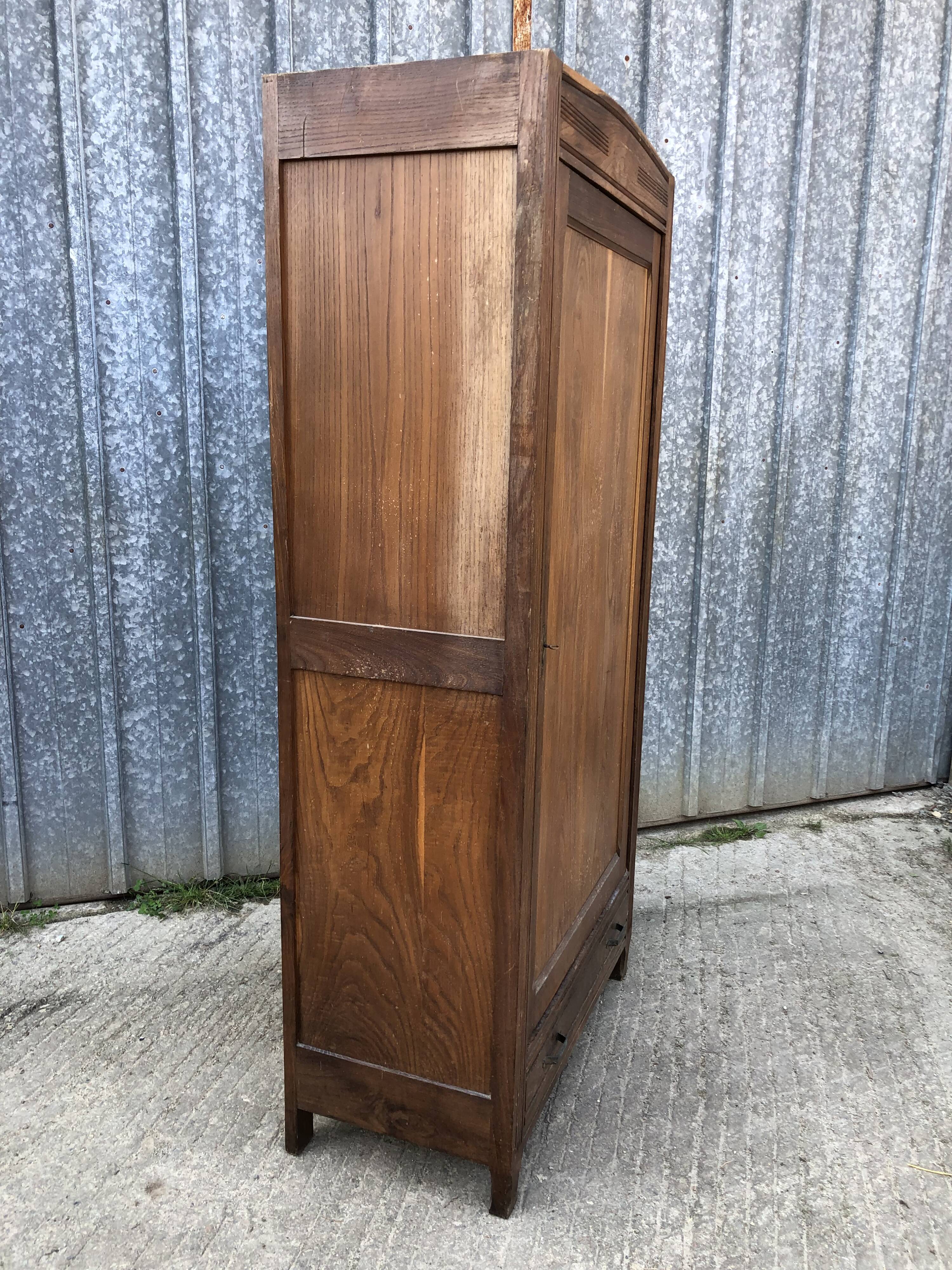 Parisian Bonnetiere armoire from the 1900s in solid chestnut.