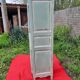 Antique patinated bonnet maker