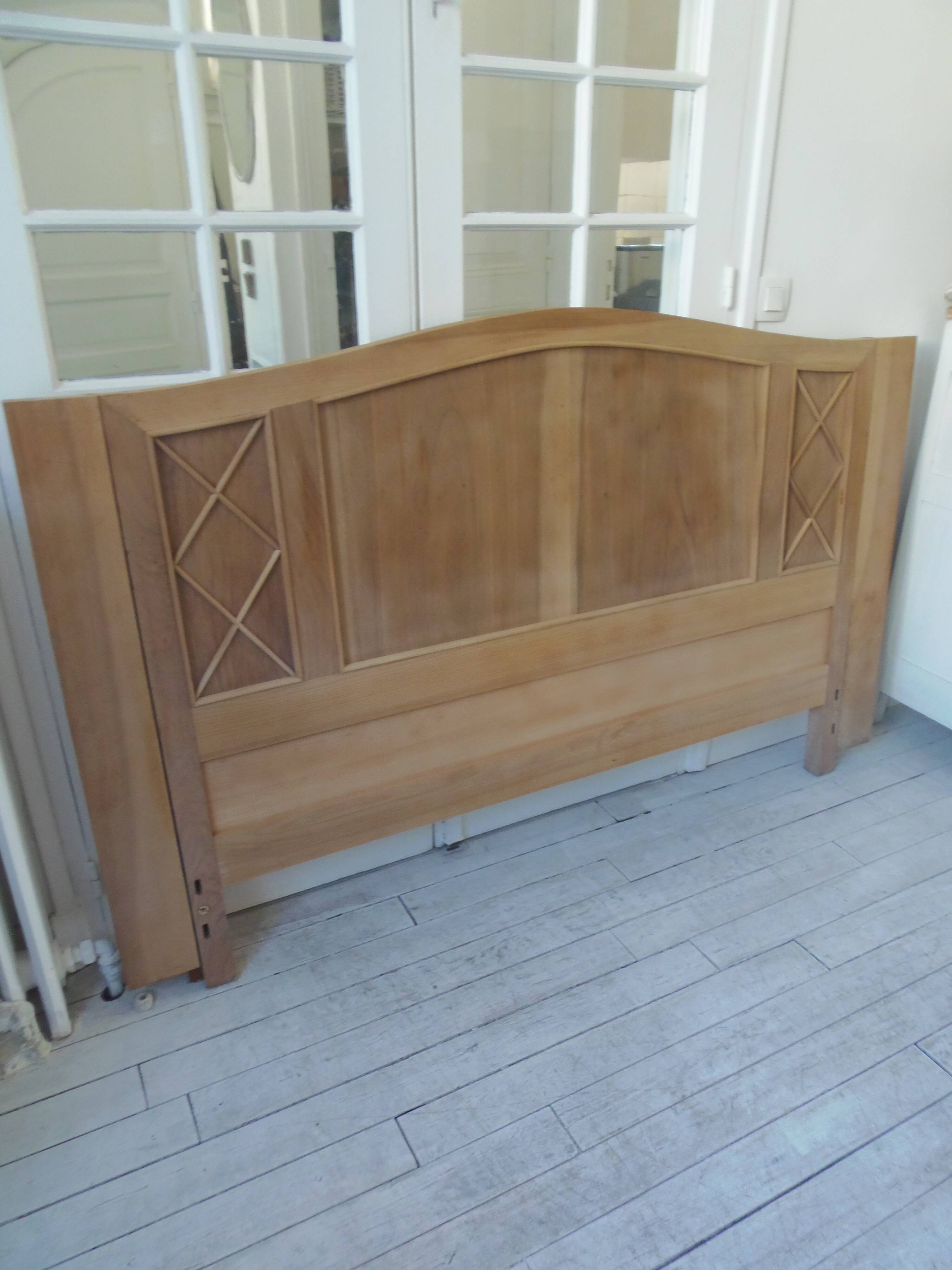 Headboard for a 160 bed in solid walnut with waxed finish.