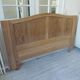 Headboard for a 160 bed in solid walnut with waxed finish.