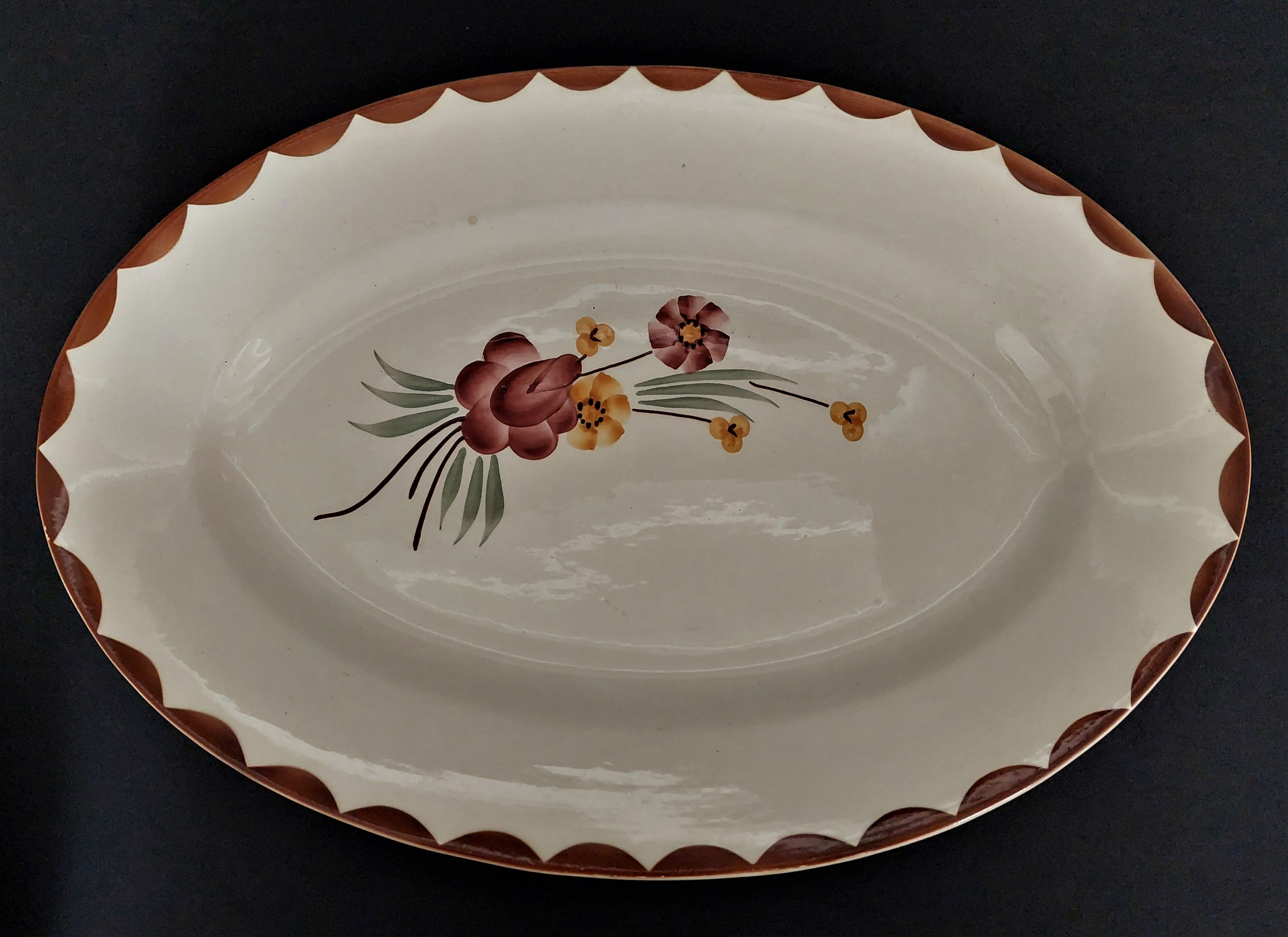 Oval earthenware serving dish HBCM Creil Montereau décor Huguette early twentieth century