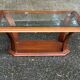 Table basse vintage en bois massif et verre