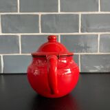 Théière rouge en tôle émaillée