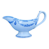 Old earthenware sauce boat