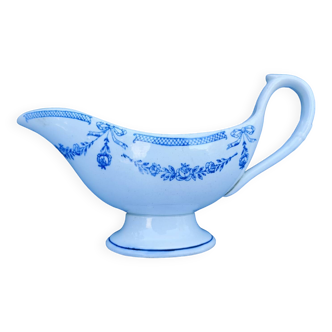 Old earthenware sauce boat