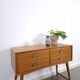 Vintage teak Danish chest of drawers with high slanted legs, side table, sideboard.