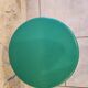 Tam Tam designer stool in green plastic