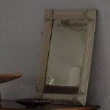 Wall mirror in tramp art style, hand-carved with a painted white frame, early 1900s.