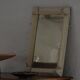 Wall mirror in tramp art style, hand-carved with a painted white frame, early 1900s.