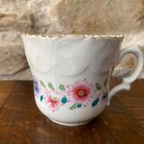 Porcelain cup with chiseled and gilded rim