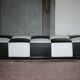 Roche Bobois black and white checkered leather bench, low bench.