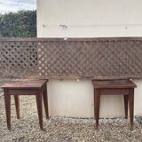 Headboard and its two wooden bedside tables.