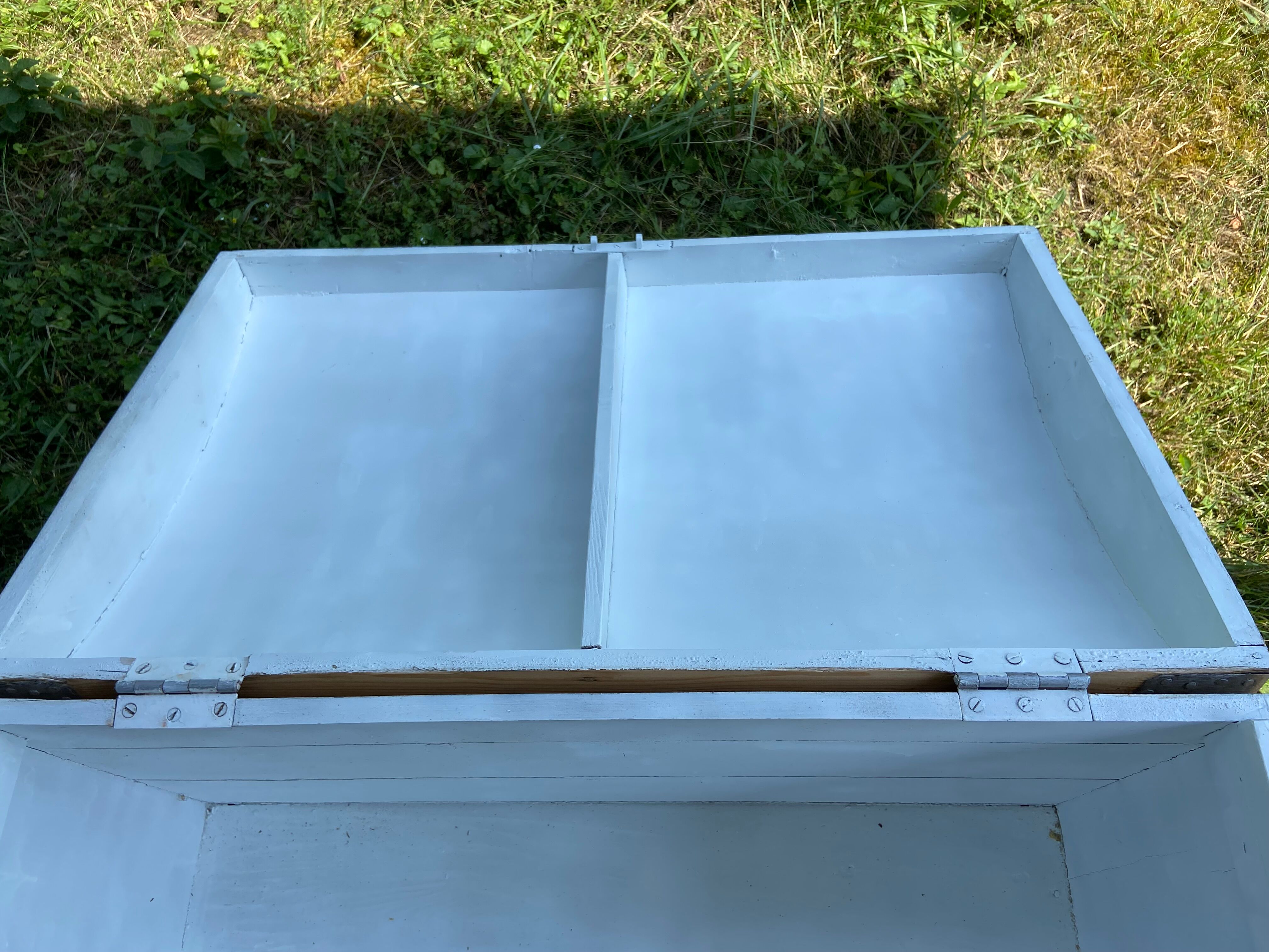 Raw wooden chest with a secret drawer