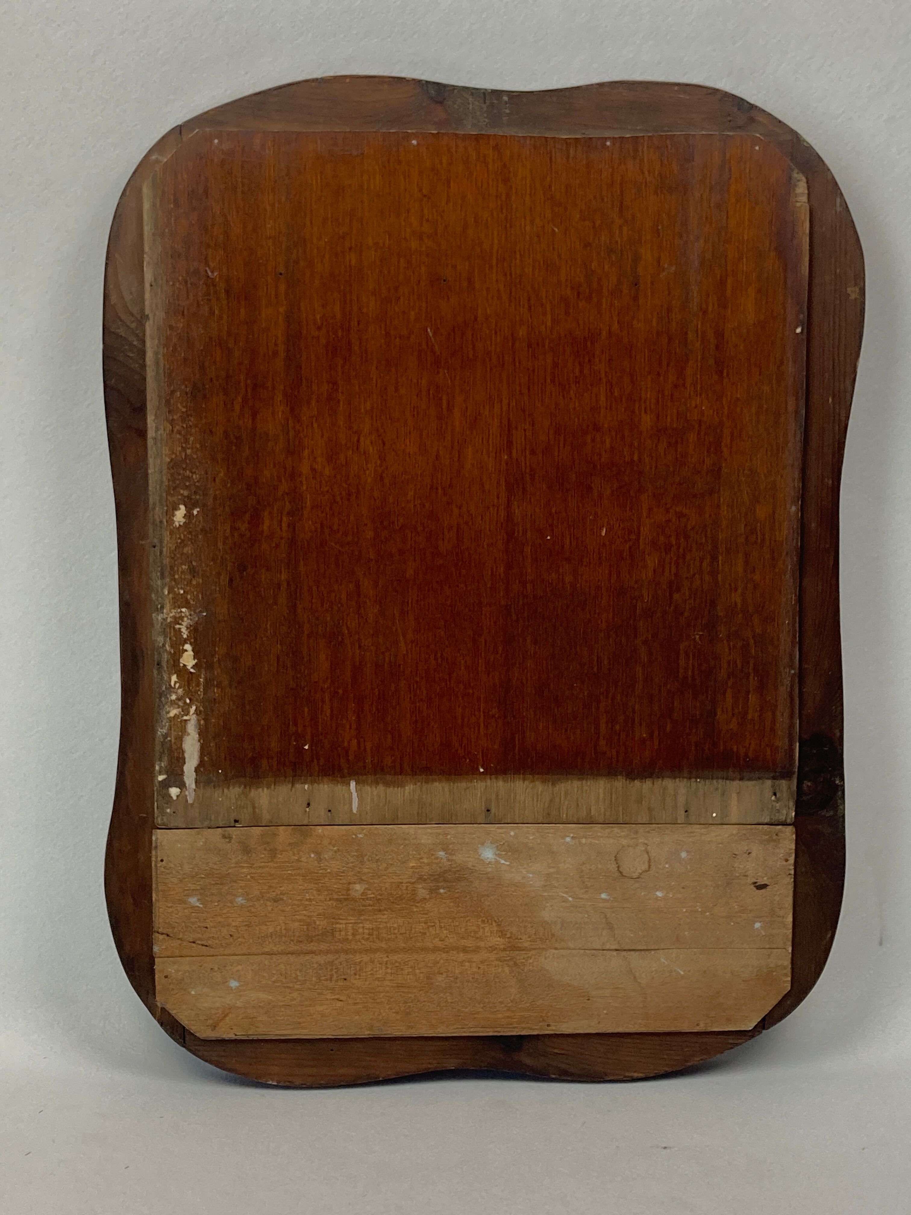 Hand carved wavy curvy vanity mirror, ca 1900