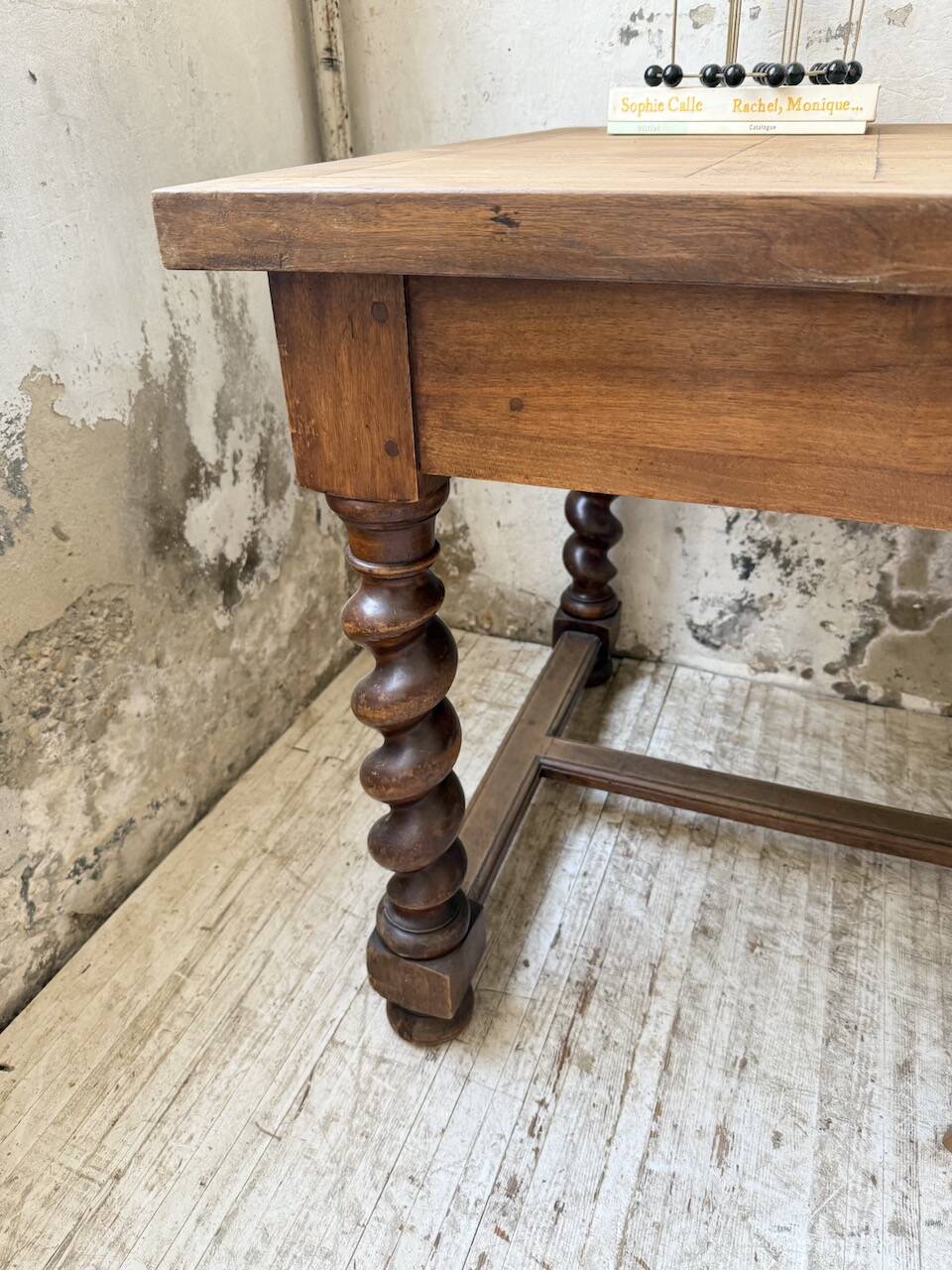 Paneled walnut desk with turned legs, 1900