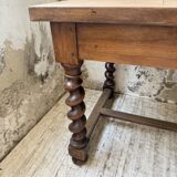 Paneled walnut desk with turned legs, 1900