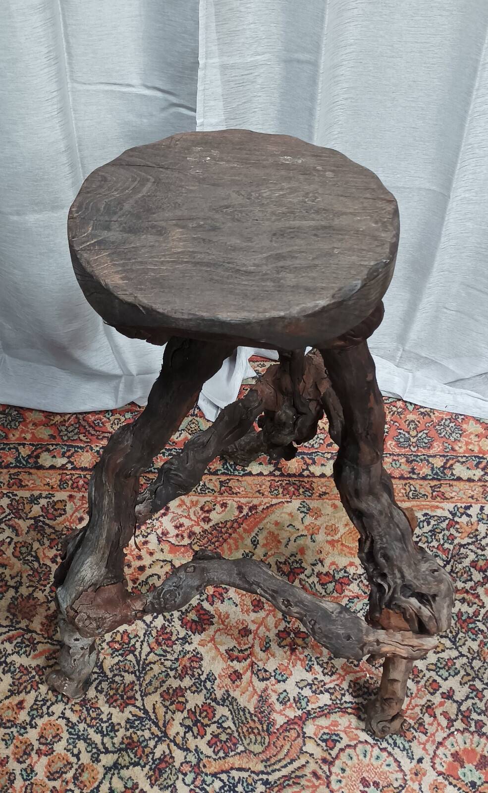 Brutalist bar stool made of vine wood