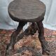 Brutalist bar stool made of vine wood