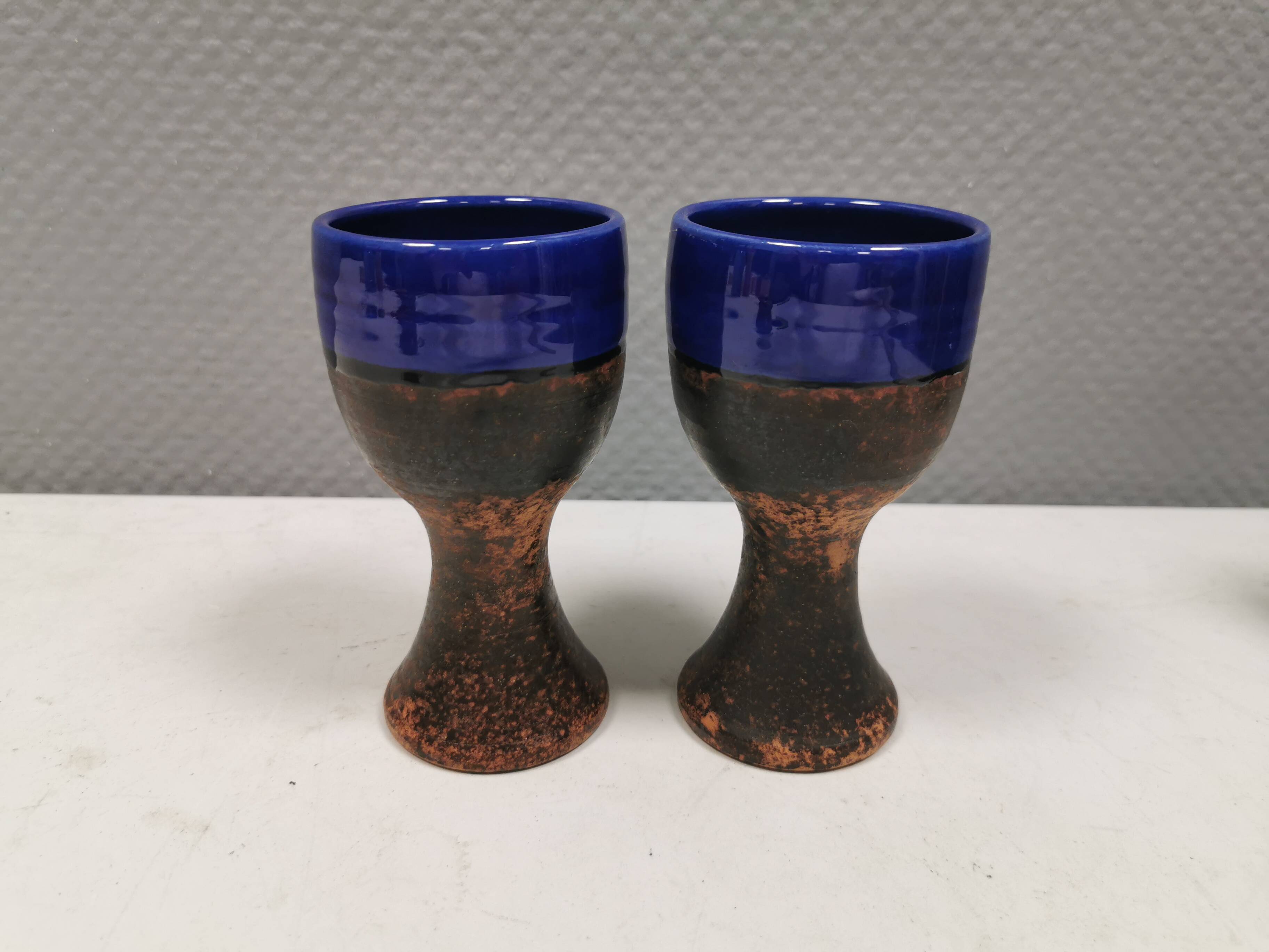 Two mugs in partially blue-glazed ceramic, from Seilast Wisby Sweden