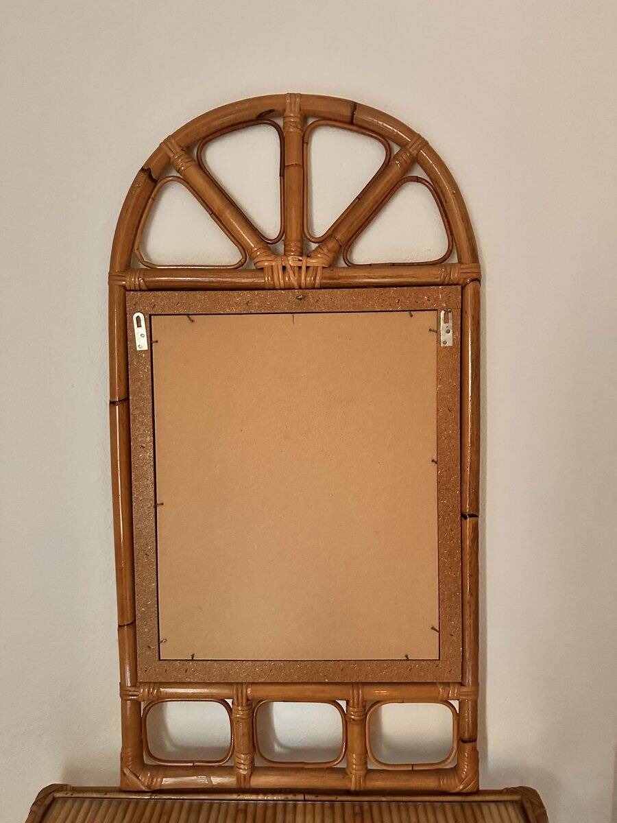 Curved half-moon console in rattan and bamboo with mirror by Vivai del Sud, Italy, 1960s.