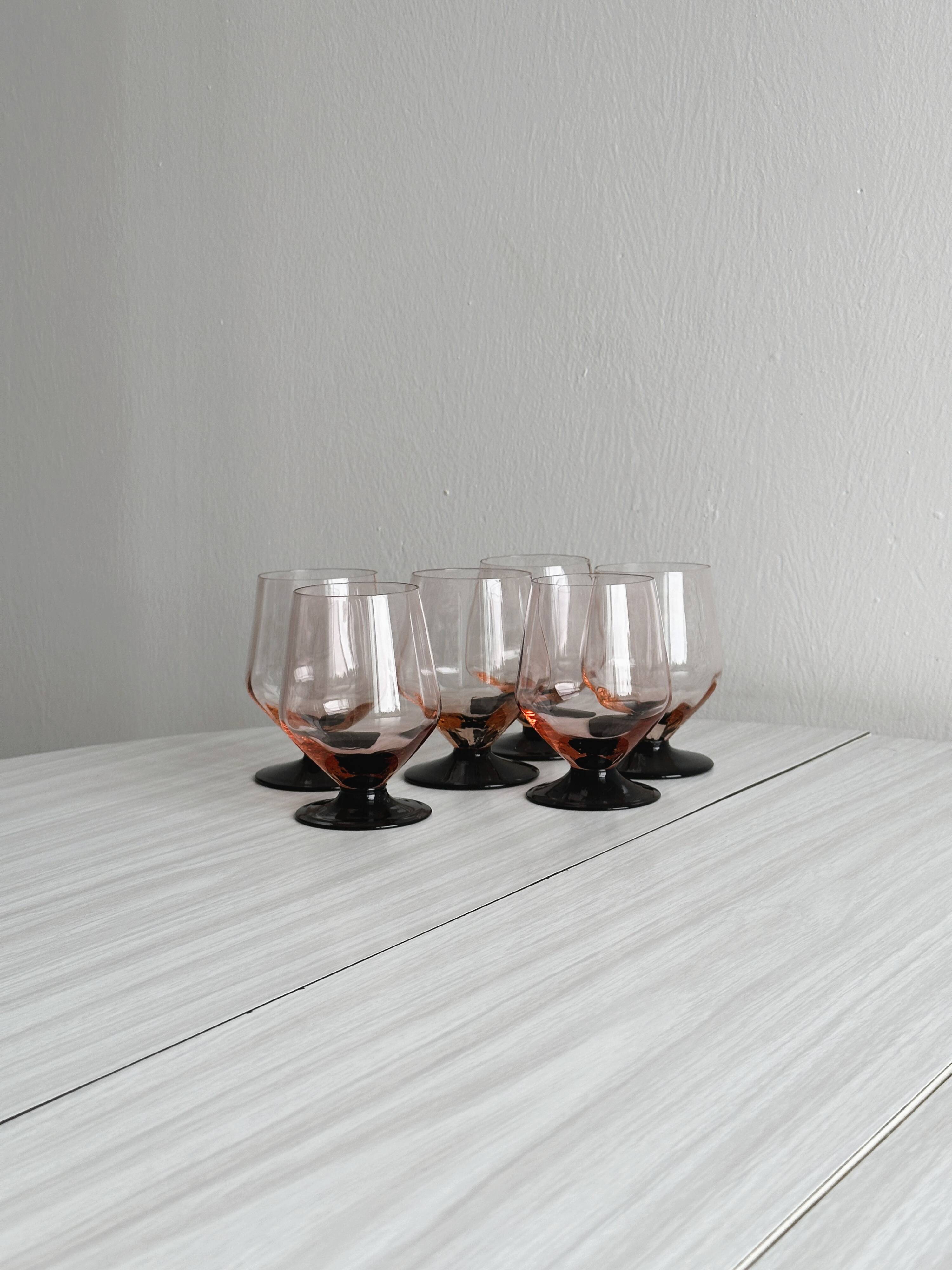 6 vintage translucent pink glasses with black stems