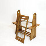 Served in oak and glass from the 50s and 60s.