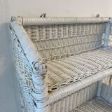 White wicker wall shelf
