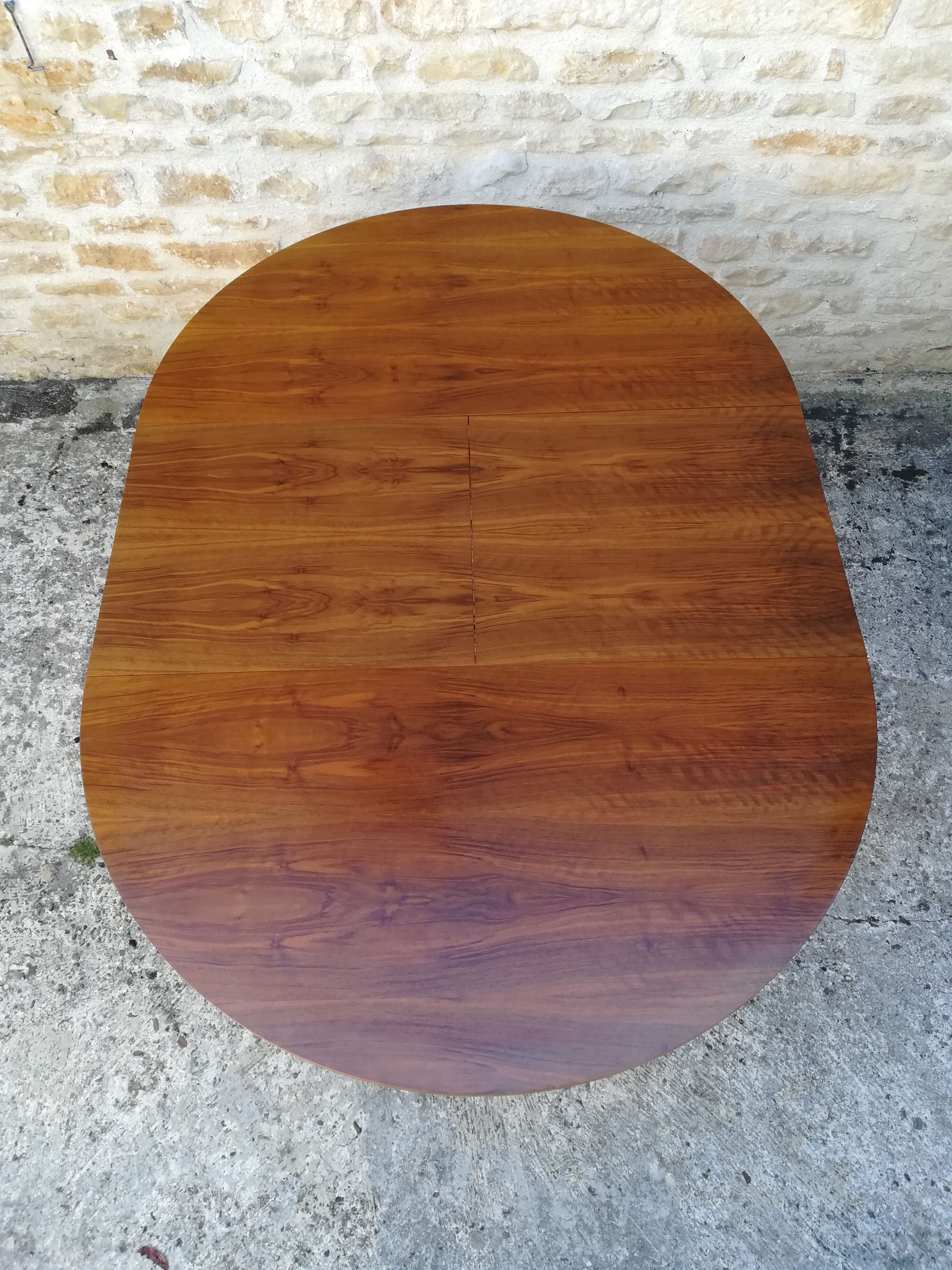 Round table with an extension