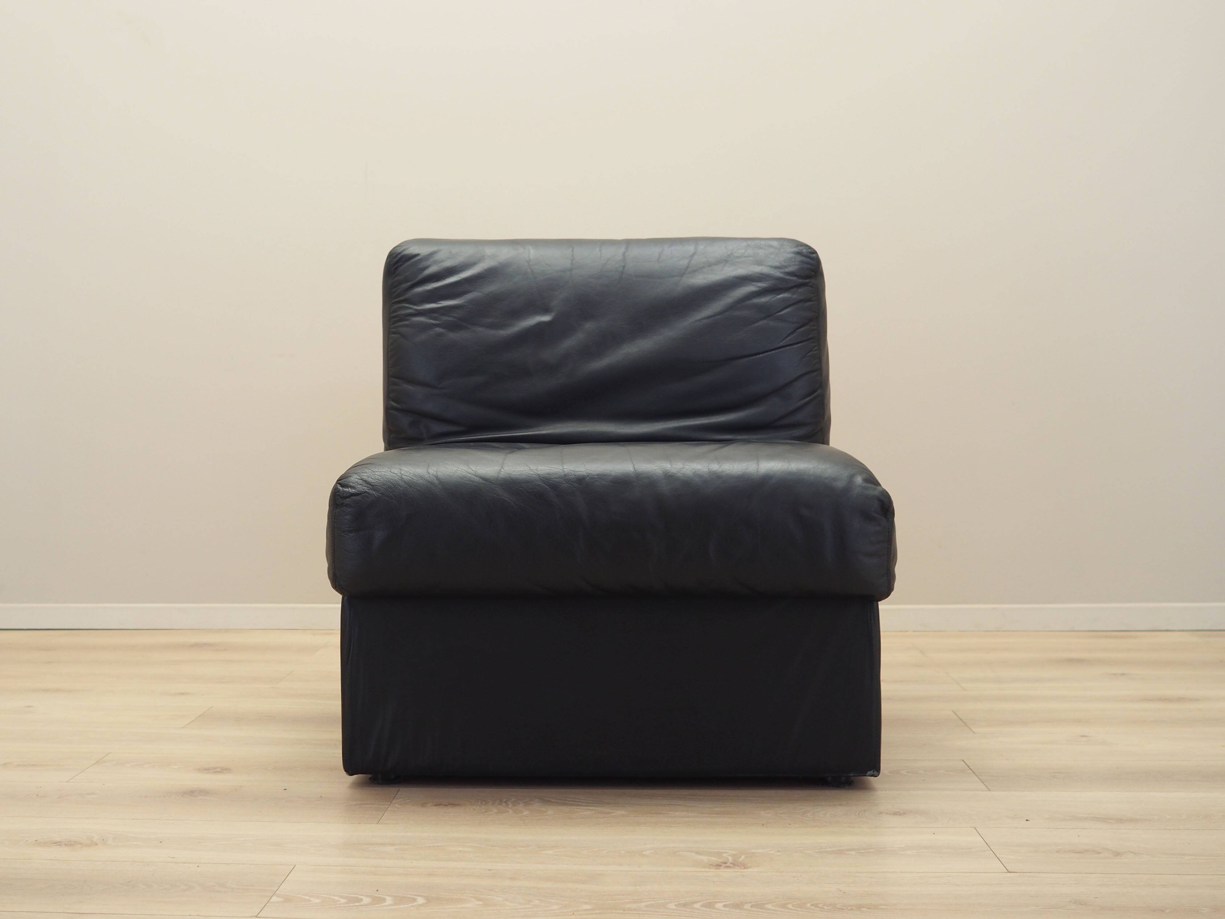 Black leather pouffe/armchair, Italian design, 1960s, production: Italy