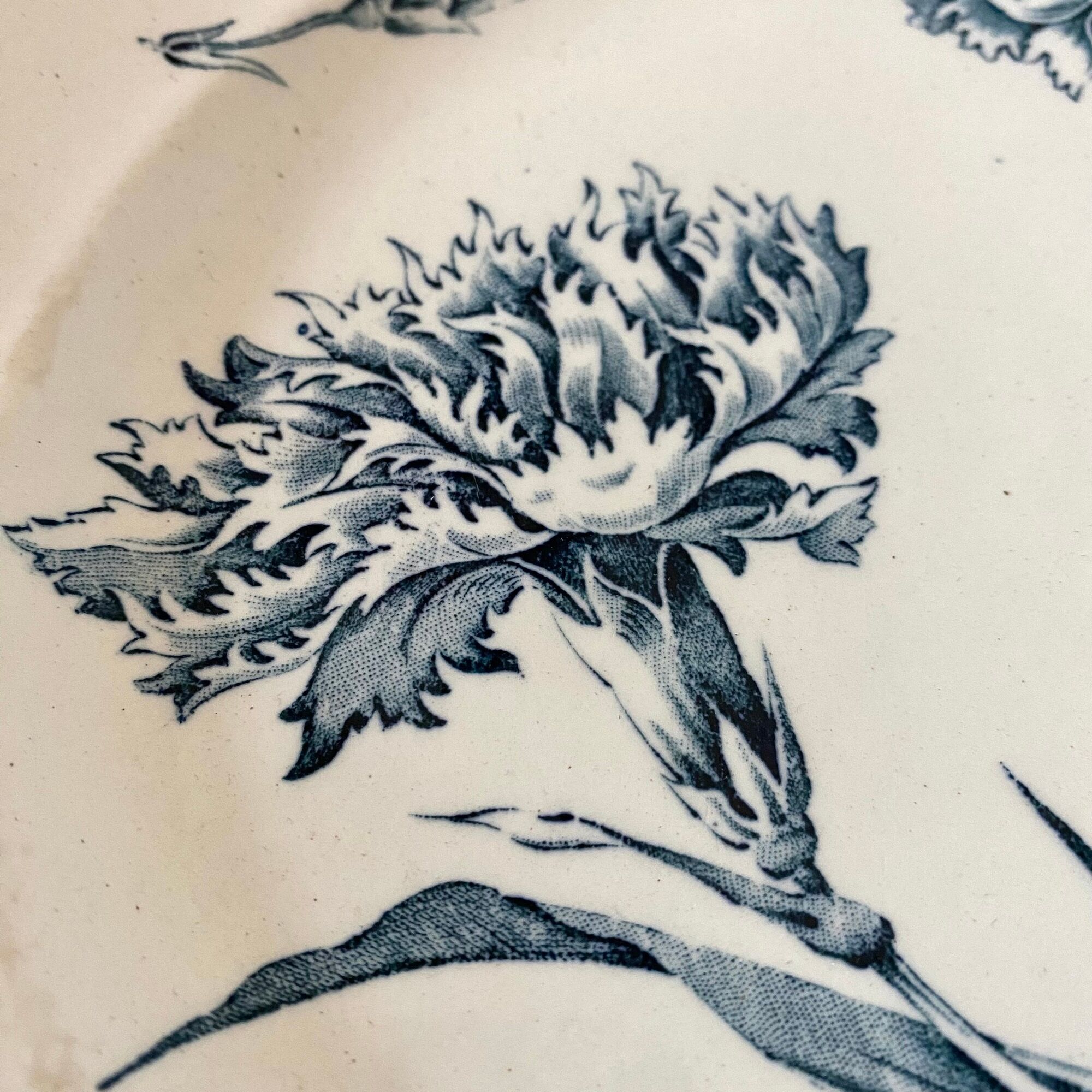 Antique dishes on foot in Luneville carnation porcelain