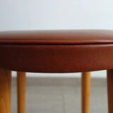 Baumann low stool from the 60s in brown leatherette